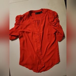 New York & Co size medium orange button up with puffy sleeves
